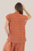 Sleeveless wrap top with crinkle striped and draped front